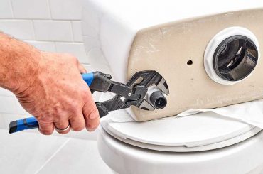 replace a toilet flush valve